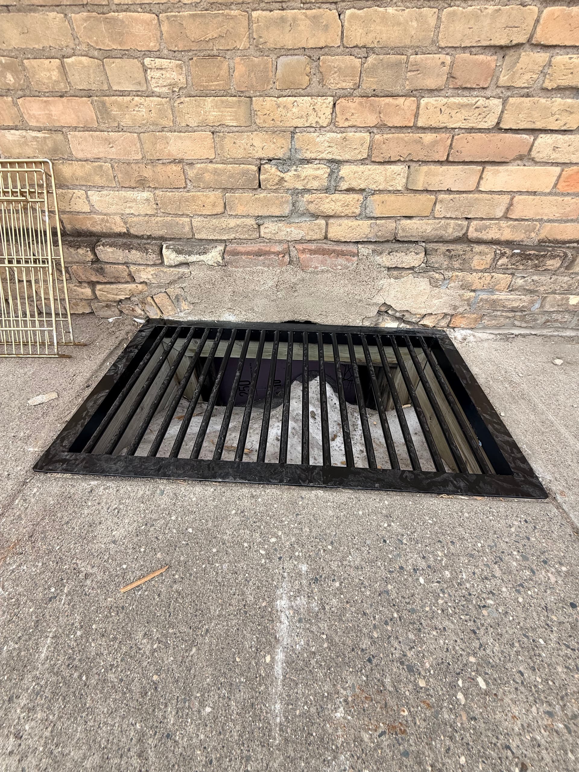 Custom Steel Grate for Kindred Grocery Store Installation
